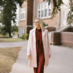 President Polly Peterson stands in front of Taber Hall.