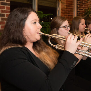 Three trumpet players