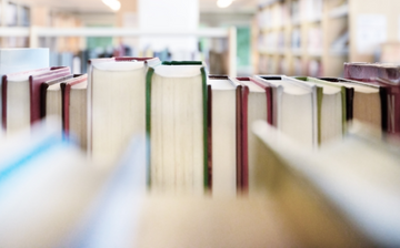 Close-up image of a library book shelf