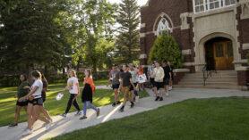 Students walk in front of Voorhees Chapel