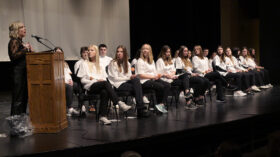 Sophomore students are welcomed into the University of Jamestown Nursing Program by alumna Trisha Jungels, ’02, during an induction ceremony on Jan. 12, 2023.