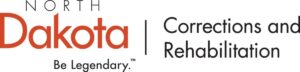 North Dakota Department of Corrections and Rehabilitation logo featuring 'North Dakota' in red text with the 'Be Legendary.' slogan below, and 'Corrections and Rehabilitation' in black text to the right