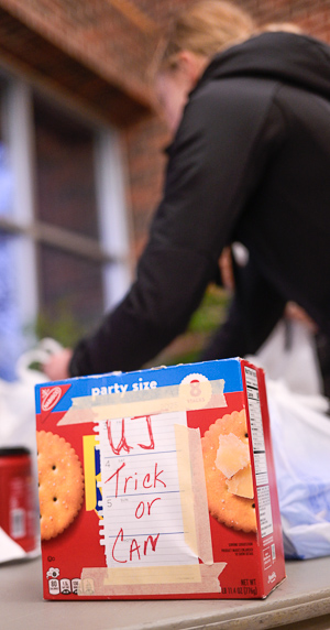 A box of crackers is labeled "UJ Trick Or Can."