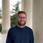 A headshot of Michael