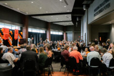 Photo of a crowded room during homecoming event