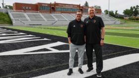 mistro and dosch on football field